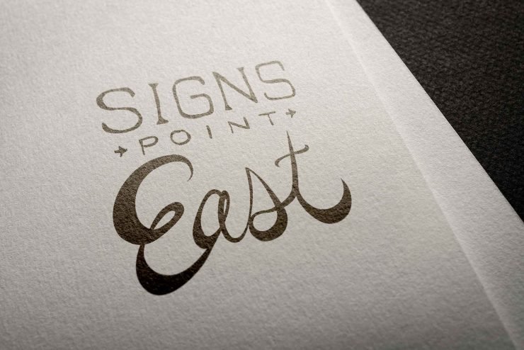 Signs Point East